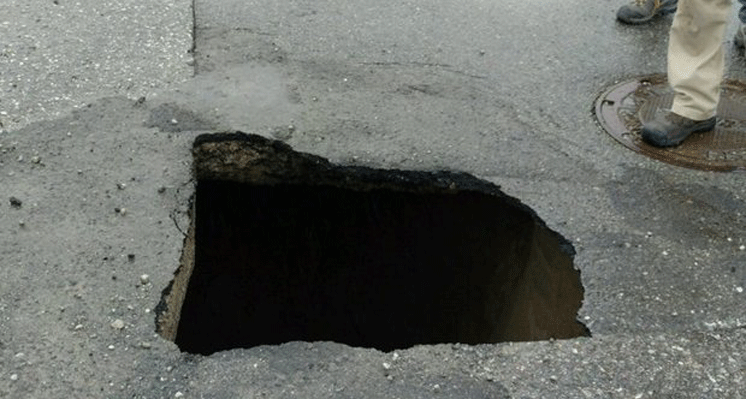 Sinkhole shuts down intersection in northern Genesee County