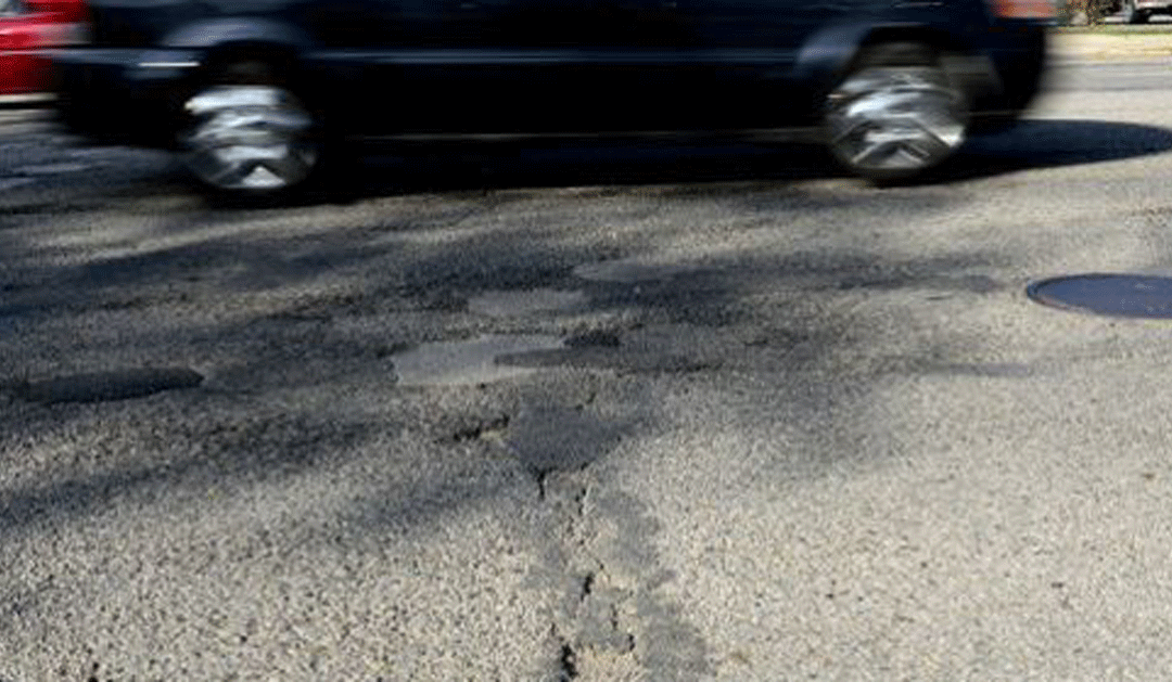 Poll: New Lansing mayor must fix roads, sidewalks