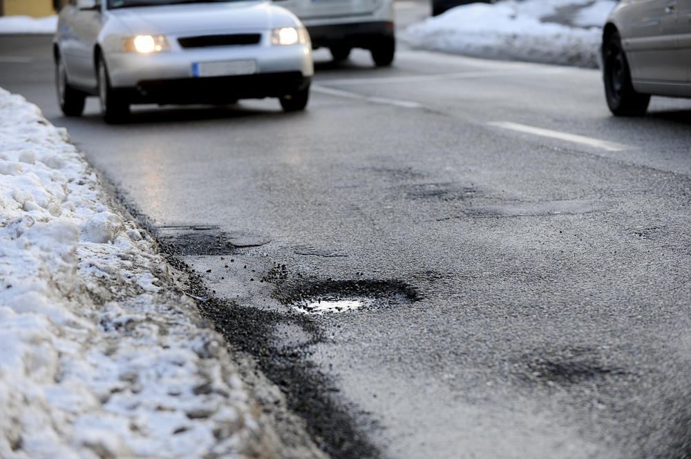 Does your body ache from hitting potholes? 5 reasons Michigan has lousy roads