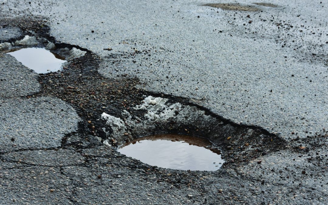 No repair in sight for potholes in Caro